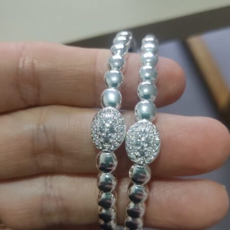 Bracelete P. bolinha zirc. crav.